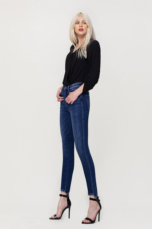 Woman in jeans and black shirt