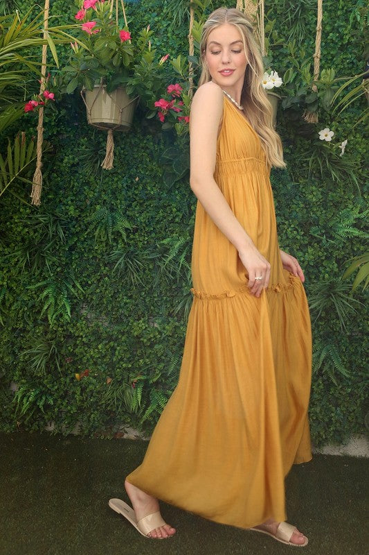 Woman in mustard color dress