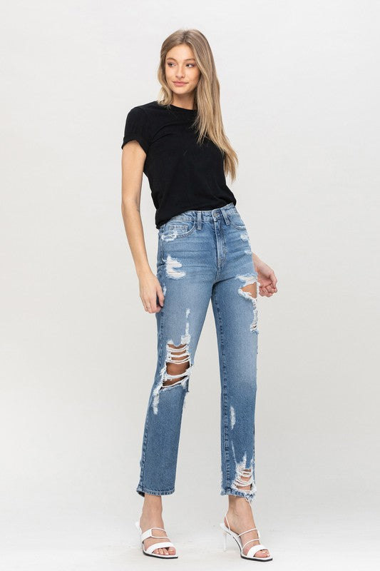 Woman in jeans and black shirt