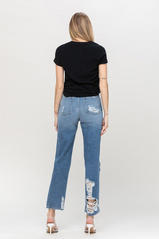 Woman in jeans and black shirt