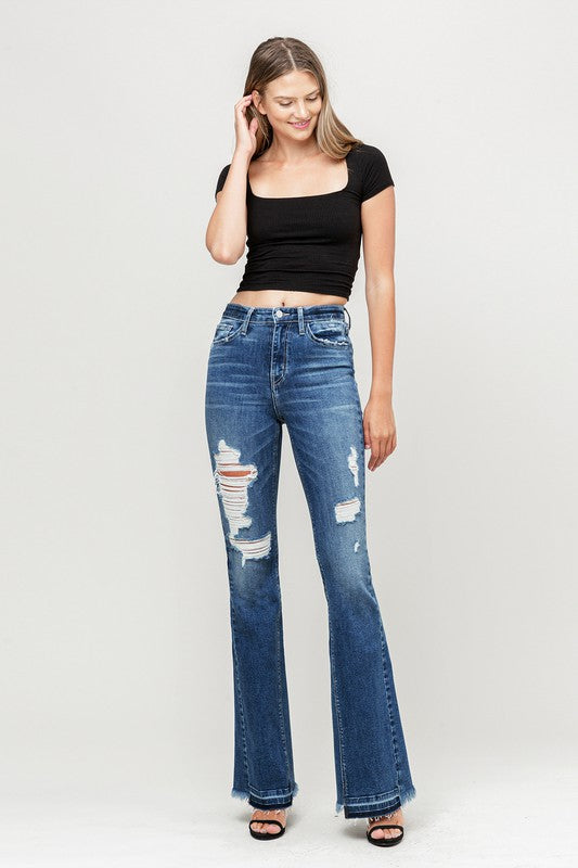 Woman in jeans and black tank top