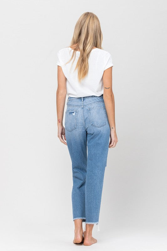 Woman in jeans and white shirt