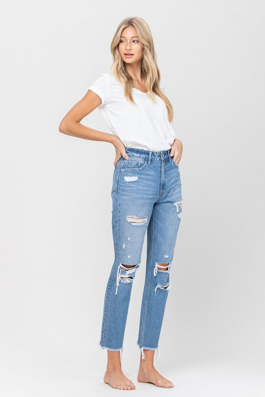 Woman in jeans and white shirt