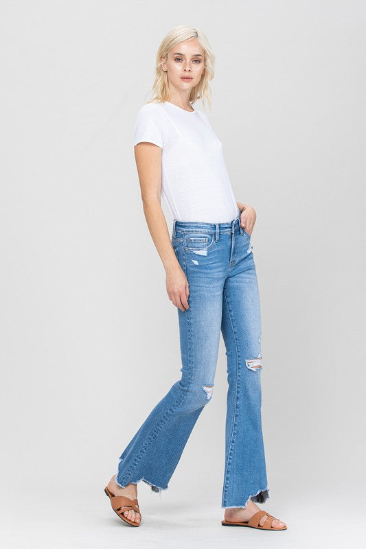 Woman in jeans and white shirt