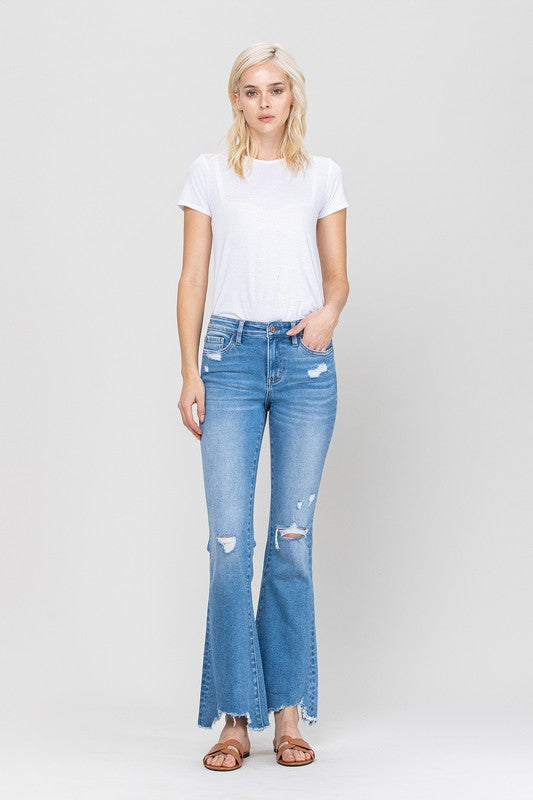 Woman in jeans and white shirt