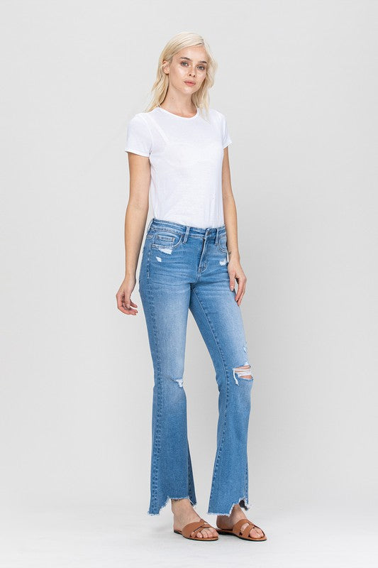 Woman in jeans and white shirt