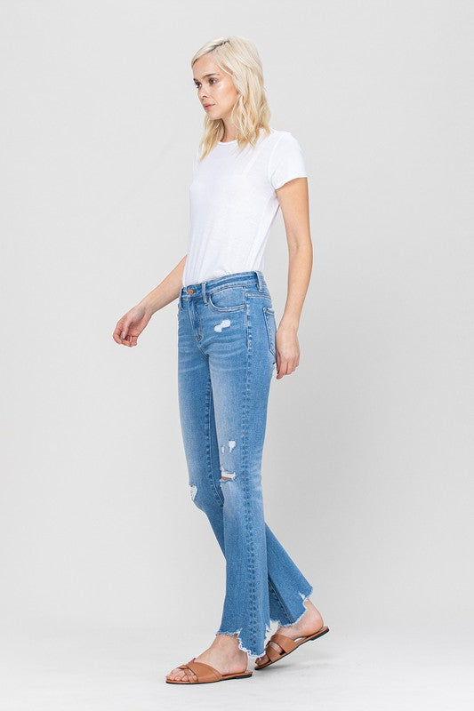 Woman in jeans and white shirt