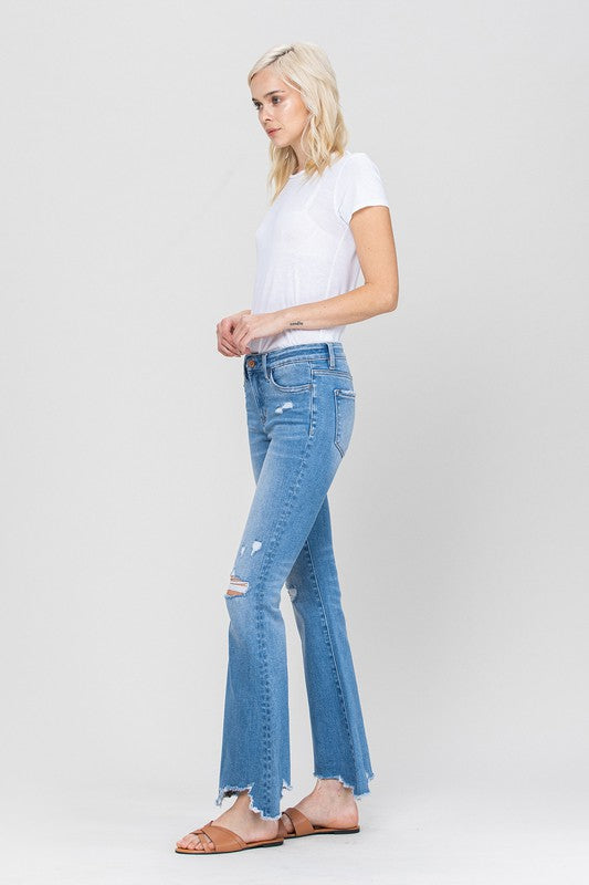 Woman in jeans and white shirt