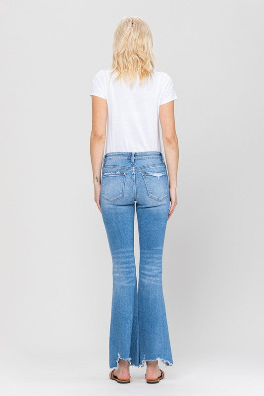 Woman in jeans and white shirt