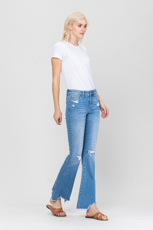 Woman in jeans and white shirt