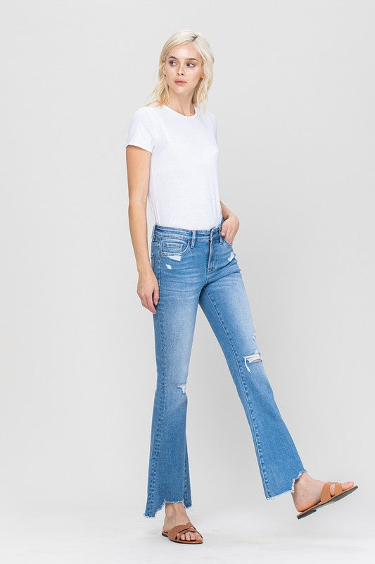 Woman in jeans and white shirt