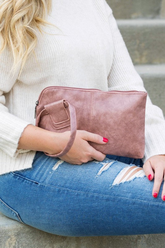 Blush colored clutch