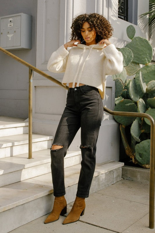 Woman in black jeans