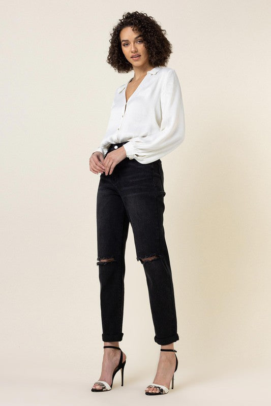 Woman in black jeans