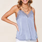 woman in steel blue camisole 