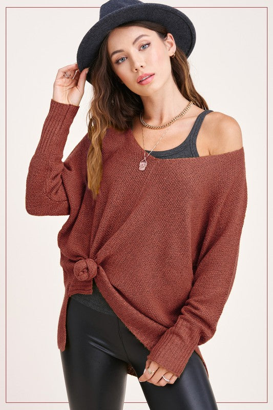 Woman in marsala colored sweater