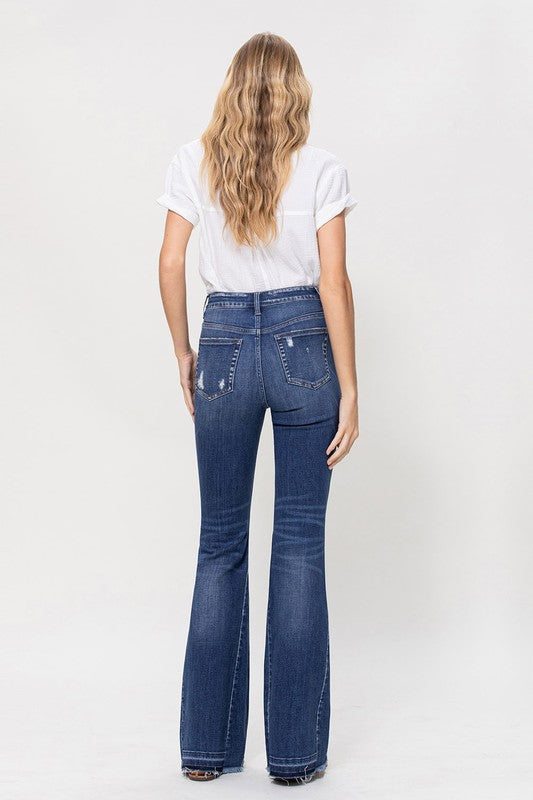 Woman in jeans and white shirt