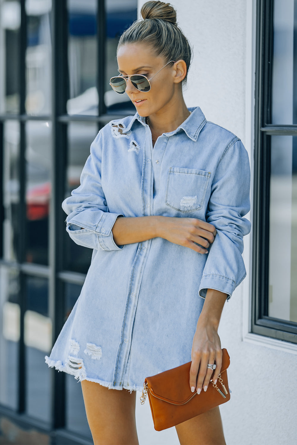 Woman in denim snap down jacket