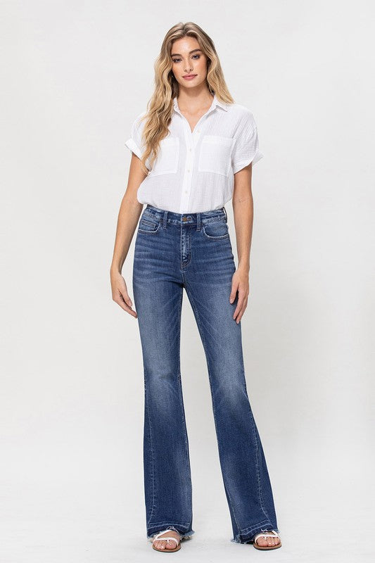 Woman in jeans and white shirt