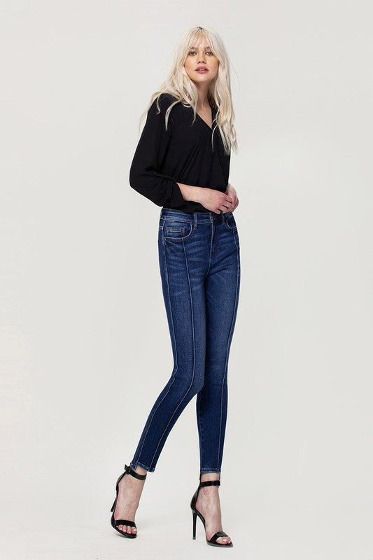 Woman in jeans and black shirt