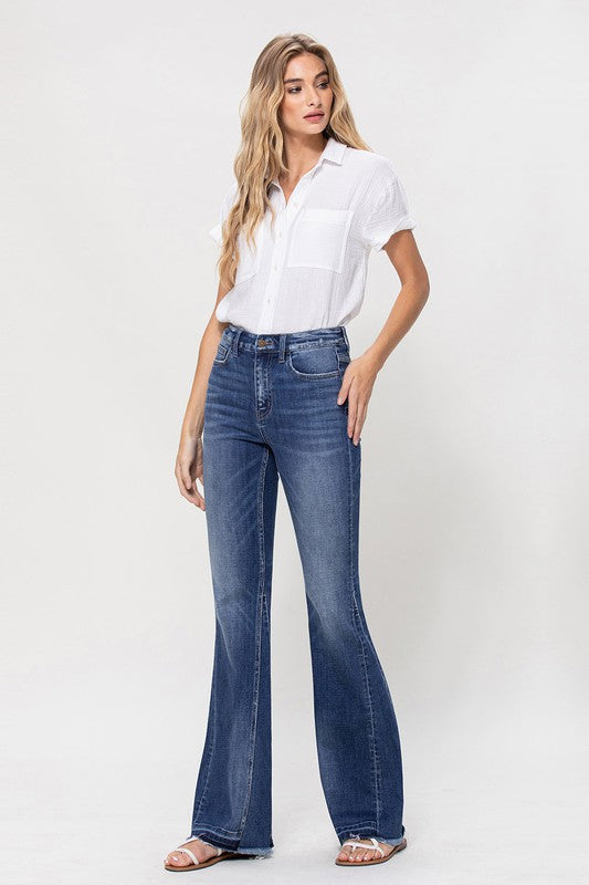 Woman in jeans and white shirt