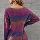 Woman in multicolored sweater